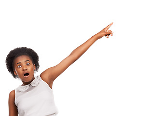 Image showing Surprise, pointing and portrait of black girl in studio with mockup space for marketing or advertising. Shock, sale and African child with wow, omg or wtf face expression isolated by white background