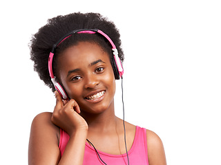 Image showing Headphones, smile and portrait of black girl in a studio listening to music, album or playlist. Happy, teenager and young African child model streaming a podcast, song or radio by white background.
