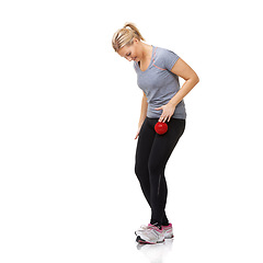 Image showing Massage ball, woman and leg joint physio for fitness, workout and sport training injury in studio. Health, stretching and exercise equipment with female person and wellness with white background