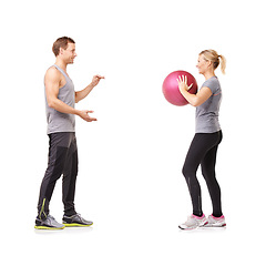 Image showing Couple in studio with fitness, gym ball and coaching for exercise, body wellness and advice. Sports workout, man and woman with sphere for balance, training and personal trainer on white background.