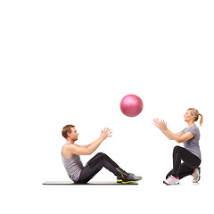 Image showing Coach, man and woman with gym ball for fitness in studio, body wellness and support. Sports workout, fit girl and personal trainer with sphere for balance, training and power on white background.