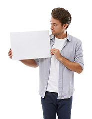 Image showing Mockup, advertising and man on poster, sign and space isolated on a white studio background. Serious person show paper banner, sales promotion or blank placard presentation, information and billboard