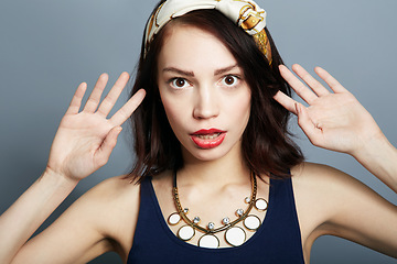 Image showing Portrait, surprise and woman with wow, gossip and announcement on a grey studio background. Face, person and model with facial expression, shocked and news with deal, opportunity and omg with emoji