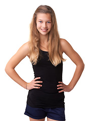 Image showing Portrait, smile and teen kids for fashion with a blonde girl in studio isolated on a white background. Model, trendy or style and a happy young child looking confident in a casual clothing outfit