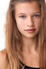 Image showing Portrait, skincare and child with teen studio cosmetics, hairstyle maintenance treatment and spa beauty. Skin wellness glow, face and hair care girl, young kid or model grooming on white background