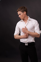 Image showing Man, thinking and fashion confidence on black background for clothes outfit, cool style or formal dress up. Male person, edgy thoughts and model on mockup space for studio, event clothing or serious