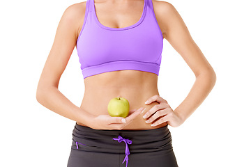 Image showing Woman, apple and stomach for health in studio with mock up for diet for digestion on white background. Female person, hold and fruit for nutrition, wellness and care with fresh, organic and produce.
