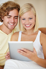 Image showing Smile, tablet and young couple on sofa browsing on social media or internet at apartment. Happy, digital technology and man and woman from Australia relax and scroll on website in living room at home