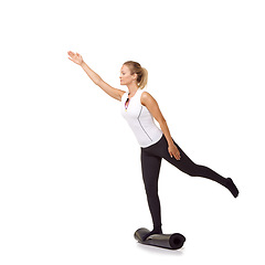 Image showing Woman, exercise and mat in studio for balance, pilates or workout for healthy body, wellness or fitness. Person, face and yoga in sportswear for physical activity on mock up space or white background