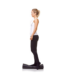 Image showing Woman, exercise and mat in studio for balance, pilates or workout for healthy body, wellness or fitness. Person, face and yoga in sportswear for physical activity on mock up space or white background