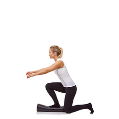 Image showing Woman, lunge and training on mat, studio profile or stretching for fitness, health or space by white background. Girl, yoga or pilates with exercise, thinking and muscle development for legs on floor