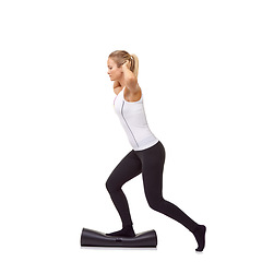 Image showing Woman, exercise and mat in studio for workout, pilates or fitness for healthy body, wellness or balance. Person, face and yoga in sportswear for physical activity on mock up space or white background