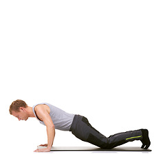 Image showing Man, strong fitness or push up exercise on knee in workout, power or mockup in studio on white background. Profile of healthy guy training on mat for core muscles, balance or plank challenge on floor