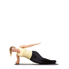 Image showing Woman, pilates or mat in studio for stretching, fitness or workout for healthy body, wellness or core muscle. Person, portrait or happy on floor for abdomen health on mockup space or white background