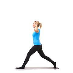 Image showing Yoga, health and workout with woman in studio for stretching, exercise and wellness. Gym, fitness and self care with female person on floor of white background for pilates, body and mockup space
