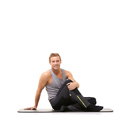 Image showing Man, exercise and portrait on floor of studio for fitness, healthy training and smile isolated on white background. Wellness, workout and happy personal trainer on mat for strong body at mockup space