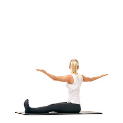 Image showing Yoga, workout and relax with woman in studio for stretching, exercise and wellness. Health, fitness and self care with female person on floor of white background for pilates, body and mockup space