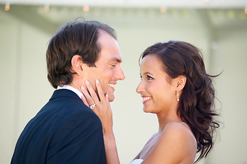 Image showing Marriage couple, happy and love for wedding commitment, promise and celebration together for care. Bride, groom and life partner, smile and ceremony event in romantic eternal bond at outdoor chuppah