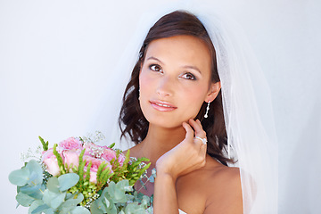 Image showing Smile, wedding and young woman with flowers for luxury marriage ceremony, party or reception. Happy, love and beautiful bride from Mexico with makeup and floral bouquet for romantic celebration.