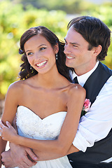 Image showing Love, happy couple hug at wedding and marriage in nature together, bonding or romance. Man, woman or bride, groom or embrace outdoor for support, commitment and connection in relationship at event