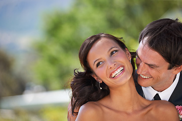 Image showing Love, happy couple at wedding or marriage in nature together, smile or romance. Man, woman or bride, groom or people outdoor for care, commitment or connection in relationship, celebration or partner