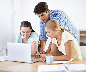 Image showing Teamwork, laptop or designers planning in meeting for news, documents or paperwork together in office. Collaboration, employees or people with research on online blog website for editing project