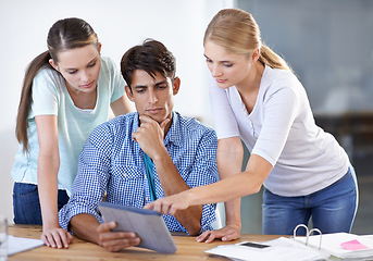 Image showing Teamwork, tablet or designers in meeting for research, news or planning together in startup office. Collaboration, talking or people pointing to media info on online blog website for editing project