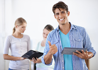 Image showing Business, portrait man with thumbs up and tablet at coworking at accounting office. Happy startup people, businessman and hand gesture for agreement, thanks and deal with digital creative agency.