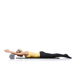 Image showing Yoga, foam roller and woman in floor exercise, stretching or gym performance for wellness, fitness or pilates training. Workout equipment, mockup studio space or person isolated on white background