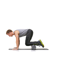 Image showing Exercise, foam roller and man in floor push up for arm strength building, muscle growth or bodybuilding workout. Balance, mockup studio space or sports person in pilates training on white background