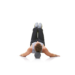 Image showing Balance exercise, foam roller and person in pilates workout, floor stability or muscle endurance activity. Studio, gym equipment and athlete fitness for core strength development on white background