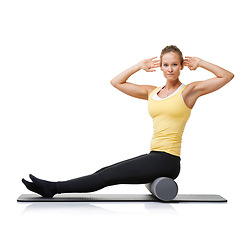 Image showing Studio workout, foam roller and portrait of woman with posture exercise, stretching or yoga performance challenge. Floor, core training or person sitting on fitness club equipment on white background