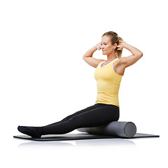 Image showing Studio workout, foam roller and pilates woman with posture training, core wellness challenge or stretching exercise for recovery. Ground, yoga mat and athlete physical activity on white background