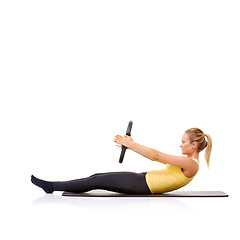 Image showing Woman, pilates ring and balance on yoga mat for resistance stretching or health, roll up or studio white background. Female person, arms equipment for muscle flexibility, wellness strength or mockup