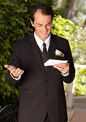 Image showing Man, vows and outdoor at wedding ceremony for marriage commitment, promise speech or romance party. Male person, paper and reading as groom for partnership celebration, relationship trust or love