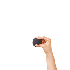 Image showing Person, hand and stress ball for anxiety, exercise or squeeze against a white studio background. Closeup of human palm with round object in anger management, relief or tension on mockup space