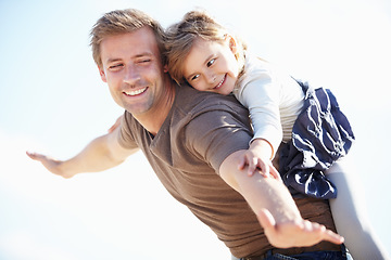 Image showing Happy, airplane and father with child in nature playing, having fun and bonding together. Smile, love and young dad carrying girl kid from Canada on back for playful freedom with sky in a park.