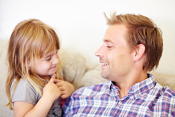 Image showing Smile, conversation and father with child on a sofa relaxing, talking and bonding together. Happy, love and young dad speaking to sweet girl kid from Australia in the living room of modern home.