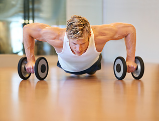 Image showing Man, exercise and pushup on floor, dumbbells or gym for muscle development, growth and results for health. Person, workout and bodybuilder with training process, strong arms and progress for wellness