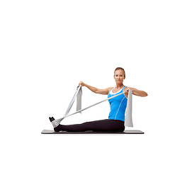 Image showing Sports, resistance band and portrait of woman doing exercise in studio for health, wellness and bodycare. Fitness, yoga mat and person from Canada with arm workout or training by white background.