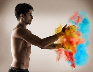 Image showing Color, explosion and man with powder in hands with creativity, performance and studio. Vibrant, paint and shirtless model with bold cloud with blue, red and yellow smoke in background or backdrop