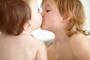 Image showing Family, love and baby siblings kissing closeup in their home for love, growth or child development. Kids, together or bonding with an infant child and his brother in a bedroom of their apartment