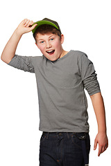 Image showing Portrait, kids fashion and wow with a boy in studio isolated on a white background for a style surprise. Smile, shocked or amazed with a happy young trendy child looking excited by announcement