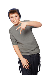 Image showing Portrait, fashion and hand gesture with a boy child in studio isolated on a white background for style. Smile, hip or trendy with a happy young kid looking confident or cool in a clothes outfit