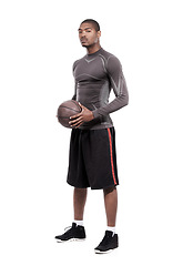 Image showing Fitness, serious and portrait of black man with basketball, confidence and muscle workout challenge. Sports wellness, health and professional athlete standing with ball isolated on white background.