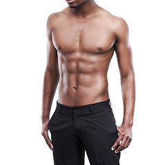 Image showing Man, model and shirtless for fitness, six pack and standing on white background, confident and abs. Studio backdrop, fit and attractive for exercise, health and muscular for body, stomach and chest