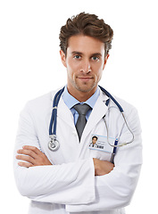 Image showing Doctor, portrait or man for arms crossed in studio, confident or healthcare employee in medical career. Specialist, face or cardiologist in trust in medicine pride or stethoscope by white background