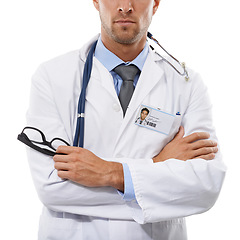 Image showing Doctor, man or name tag in studio in arms crossed or confident in medical career as ophthalmologist. Surgeon, trust and optometry for eyecare, healthcare employee and glasses help by white background