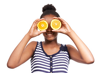 Image showing Smile, teenager and girl with orange in studio for nutrition, wellness and diet. Food, child and vitamin c with face of African student and fruit on white background for fiber, citrus and detox