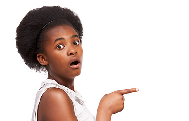 Image showing Shock, pointing and portrait of black girl in studio with mockup space for marketing or advertising. Surprise, sale and African child with wow, omg or wtf face expression isolated by white background